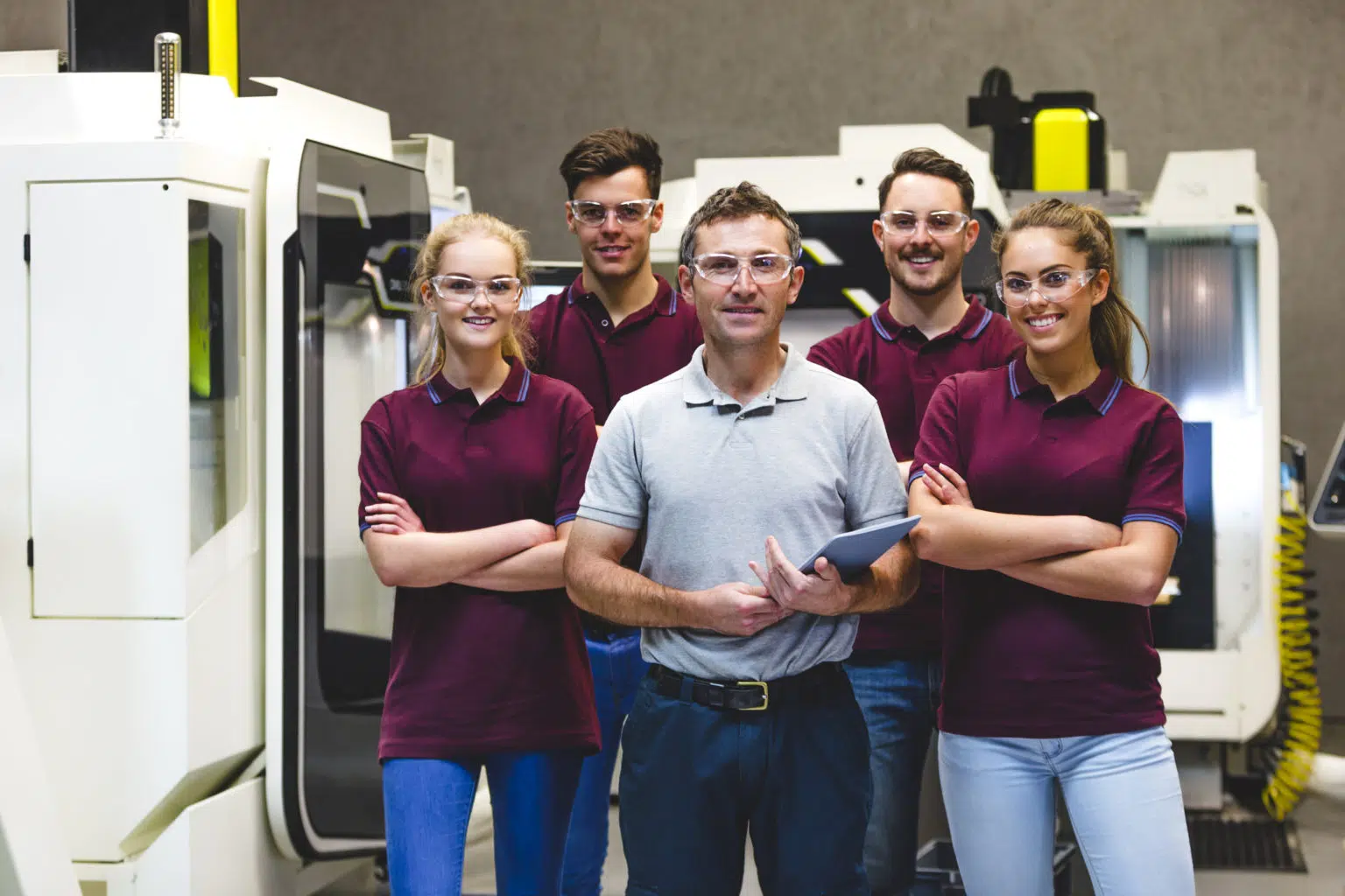 Trainer with a group of apprentices.