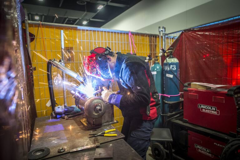 Apprentice completing at WorldSkills in welding.