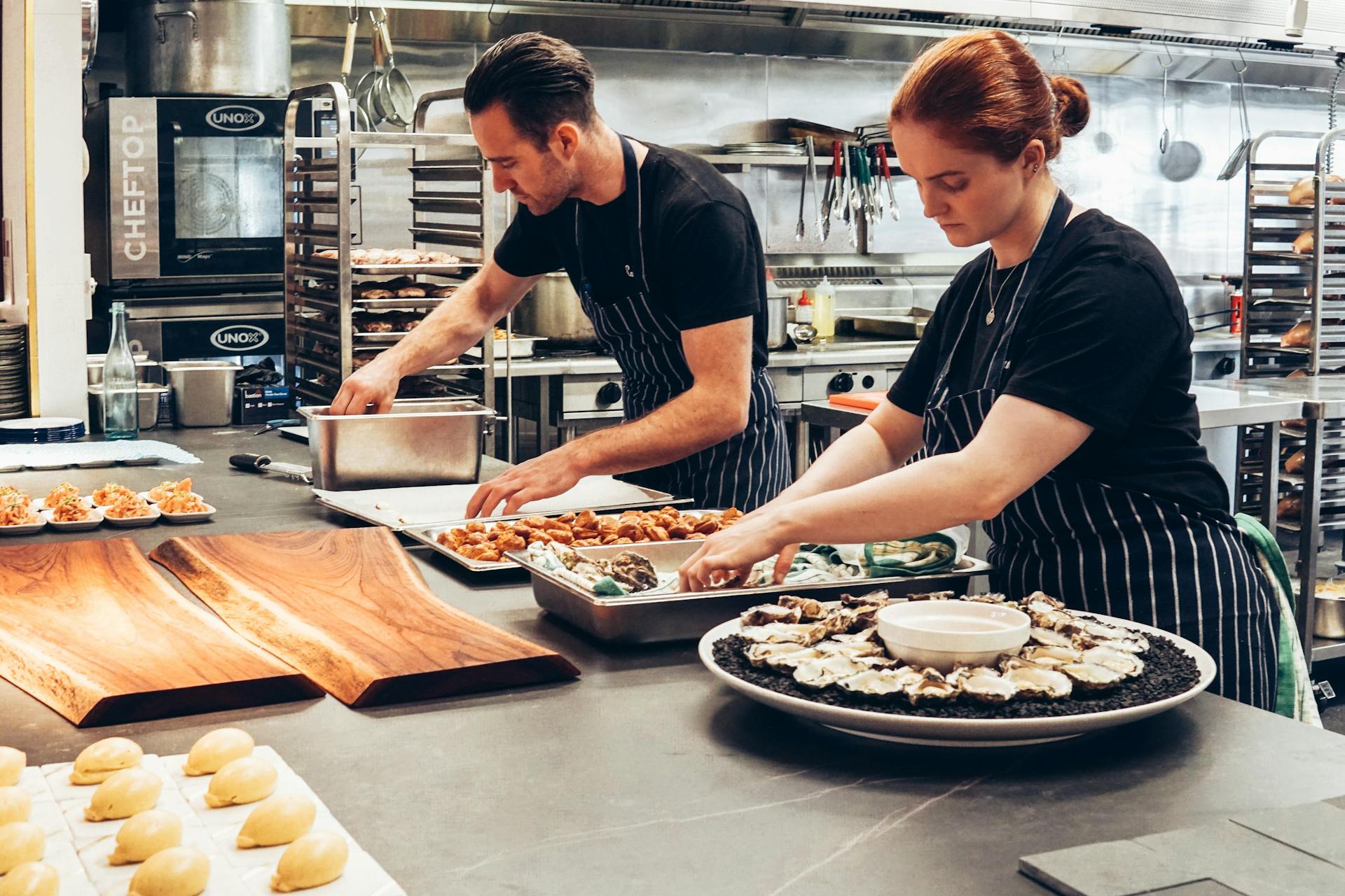 Apprentice chef working in a commercial kitchen